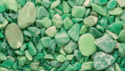 Light green glossy stones. Flat pebble rocks texture. Abstract backdrop. Top view.