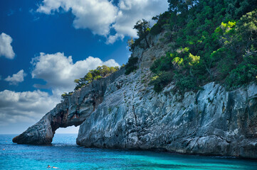 A Magnificent Portrait Showcasing the Iconic Arch of Cala Goloritze, Carved by Millennia of Coastal...