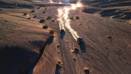 Side By Side UTVs racing in the desert canyon - Powered by Adobe