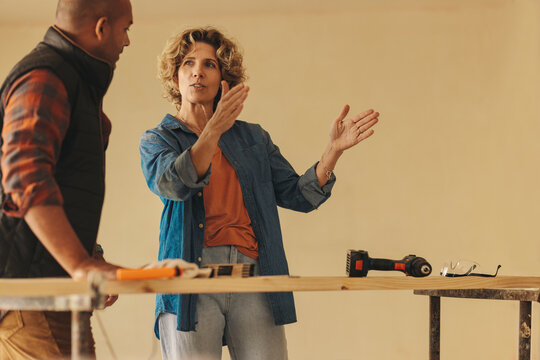 Couple collaborating on home renovation project