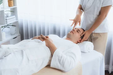 Fototapete Rund Caucasian man enjoying relaxing anti-stress head massage and pampering facial beauty skin recreation leisure in dayspa modern light ambient at luxury resort or hotel spa salon. Quiescent © Summit Art Creations