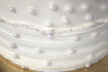 White party cake with white icing and pearls, cake design. Handmade cake made for a special...