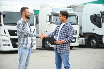 The truck driver receives documents for the cargo and the delivery route