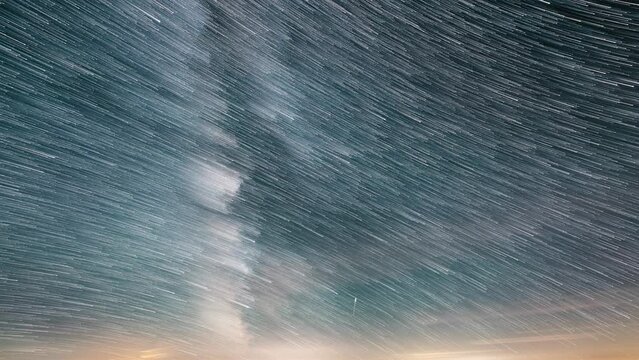 Star trails comet effect of milky way galaxy startrails time lapse background