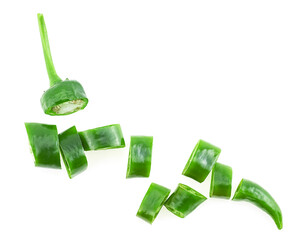 Green chili pepper cut in slices isolated on a white background, top view. Hot green peppers slices. - 761805218