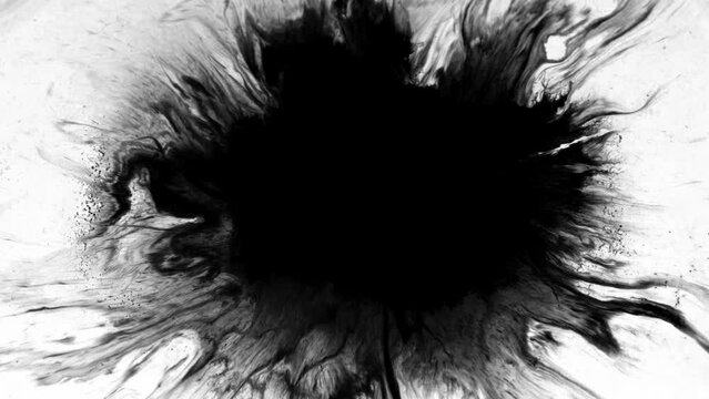 Abstract ink splatter paint in black and white recoloring .dropTurbulent painting blot spreading from the center in this contemporary reveal 3D animation. 4K background, VFX overlay, alpha matte blend