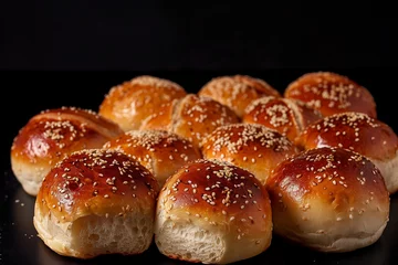Fotobehang freshly baked bread rolls on dark table © agrus_aiart