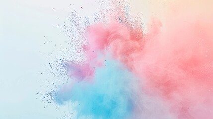 Soft pastel colored powder floating on a light background