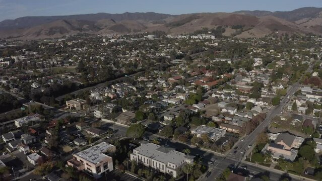 San Luis Obispo, California, USA - December 3, 2021: Aerial view of afternoon light shining on the historic buildings of the downtown core.