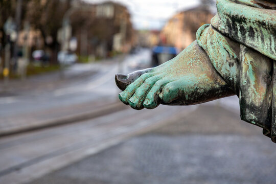 Detail from and old bronze statue in Munich