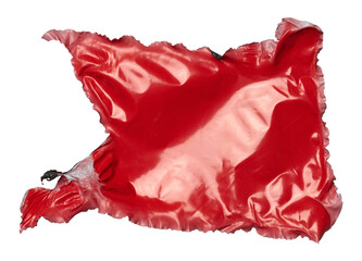 Torn piece of red polyethylene on isolated background