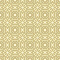 seamless pattern of yellow polka dots on a beige background.