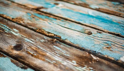 texture of vintage wood boards with cracked paint of light blue beige brown and white color retro...