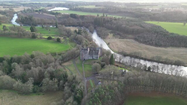 Scenic aerial footage of Doune Castle in Scotland. This 14th-century castle has become popular filming location for movies such as Monty Python and the Holy Grail, Outlander and Game of Thrones 