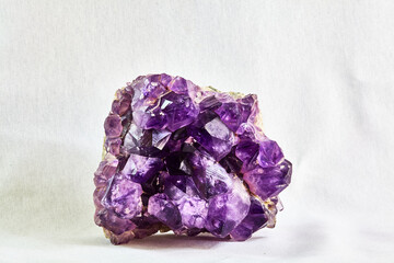 Macromineral stone amethyst in rock in crystals