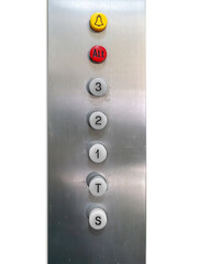1970s vintage elevator buttons with red alt key and yellow alarm key on aluminum dashboard isolated