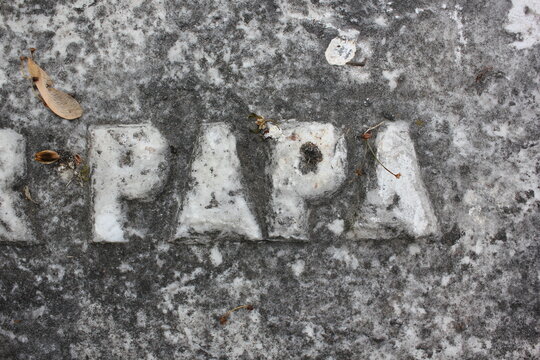 stone wall texture of a tombstone for papa