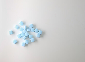 Medicine Blue Pills on White Background