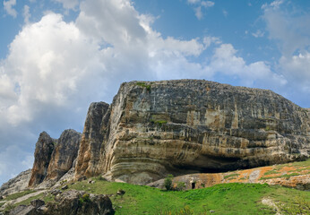 Crimea (Ukraine) mountain landscape .  In stony mountain vertical slope - ancient cave settlement...