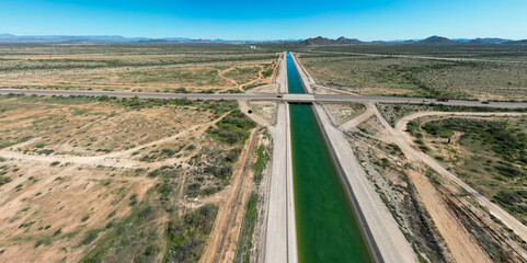 The Arizona Canal Project Near Sun City from and Aerial Drone showing the water flowing through the...