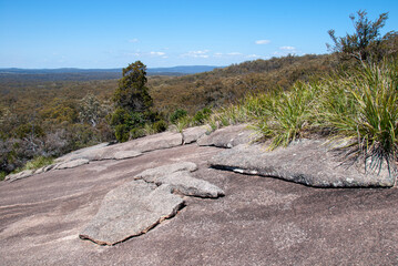 Explore the breathtaking landscapes of Girraween and Bald Rock National Park, bridging Queensland and New South Wales, Australia. Nature's harmonious border