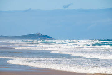 Moreton Island near Brisbane, Southeast Queensland, offers stunning beaches, shipwrecks, sand dunes, and diverse marine life