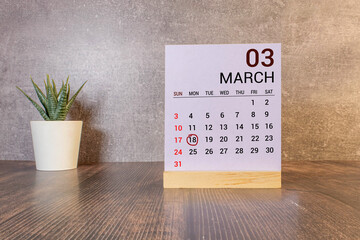 April 18, Cover design with number cube on a white background and granite table.