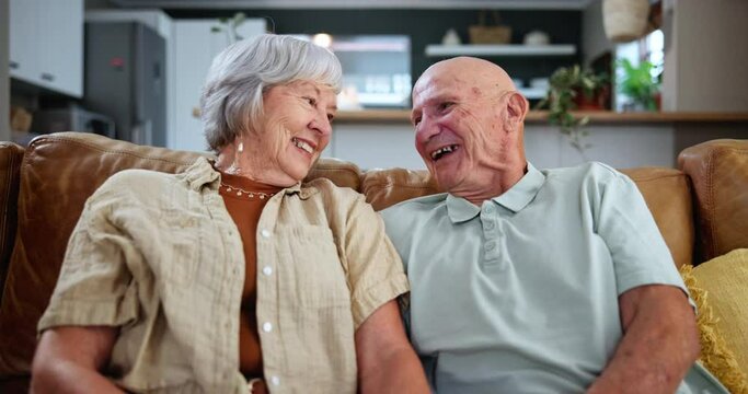 Smile, relax and senior couple watching tv together on sofa in living room of home for retirement. Television, movie or streaming service with happy elderly man and woman in apartment for bonding