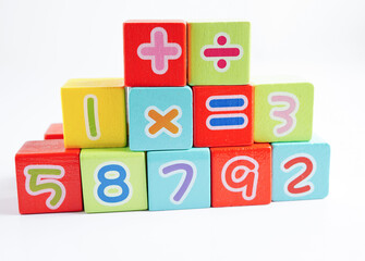 Number wood block cubes for learning Mathematic, education math concept.