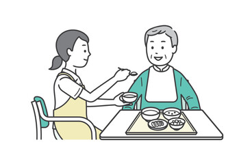 食事介助をする介護士と高齢男性のイラスト