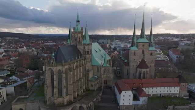 A descending cinematic shot overlooking Erfurt Cathedral and Domplatz in the German city of Erfurt in thee state of Thuringia