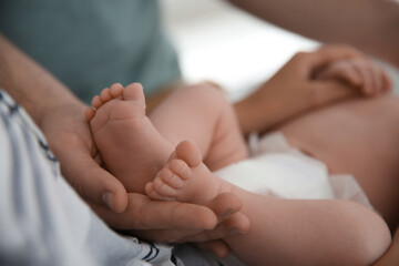 Couple with their newborn baby, closeup view