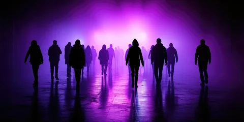Rolgordijnen A group of people walking in darkness in front of a mesmerizing purple light © Виктория Попова
