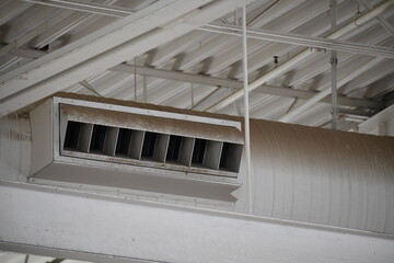 HVAC vent in industrial space. White paint.