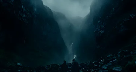  a dark cave is illuminated by a foggy waterfall © Daniel