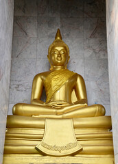 BANGKOK, THAILAND - MARCH 18, 2024: Golden Buddha statues in Buddhist temples for those who have faith to come to pay respect and worship in temples in Thailand.