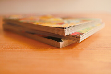 comic books on wooden table selective focus