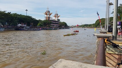 Banjarmasin, South Klimantan, Indonesia - January 8, 2024 : Floating Market Cultural Festival. The B6 jukung competition is a jukung rowing competition consisting of 6 rowers - obrazy, fototapety, plakaty