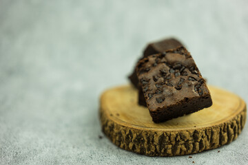 Chocolate brownies made from chocolate 100 percent and with a chocolate chip inside. Close up