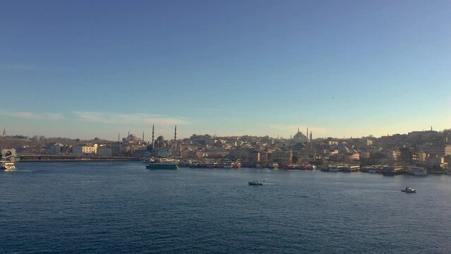 A high angle view of the Asian skyline in Istanbul while crossing the Hali&ccedil; Metro K&ouml;pr&uuml;s&uuml; (Hali&ccedil; Metro Bridge) in Istanbul Turkey on a spring afternoon.