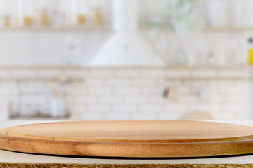 Circular Wooden Cutting Board on Kitchen Countertop