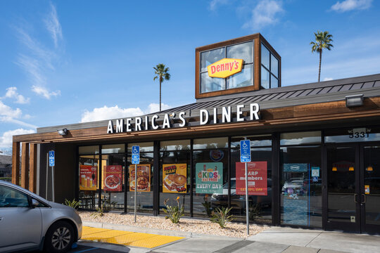 Pleasanton, CA, USA - Feb 21, 2024: Front view of a Denny's restaurant in Pleasanton, California. Denny's Corporation is an American table service diner-style restaurant chain.