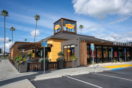 Pleasanton, CA, USA - Feb 21, 2024: Exterior view of a Denny's restaurant in Pleasanton, California. Denny's Corporation is an American table service diner-style restaurant chain.