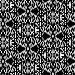 Seamless Ikat Pattern. Abstract black and white background for textile design, wallpaper, surface textures. ATLAS ADRAS ABAYAS - 761945846