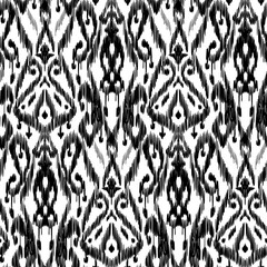 Seamless Ikat Pattern. Abstract black and white background for textile design, wallpaper, surface textures. ATLAS ADRAS ABAYAS - 761945859