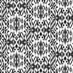 Seamless Ikat Pattern. Abstract black and white background for textile design, wallpaper, surface textures. ATLAS ADRAS ABAYAS - 761945860