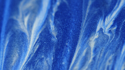 Sparkling ink drip. Acrylic spill. Defocused blue white color shiny texture paint gloss blend flow...