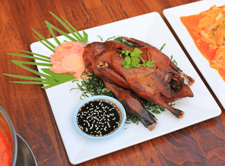 Roast Duck on wood table background. Crispy whole duck, Grilled Peking Duck. - 761952691