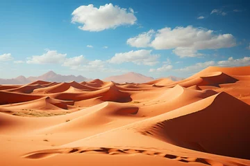 Schilderijen op glas A vast desert landscape with sand dunes, mountains, and a clear blue sky © dong