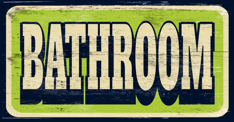 Aged and worn bathroom sign on wood - 761964432